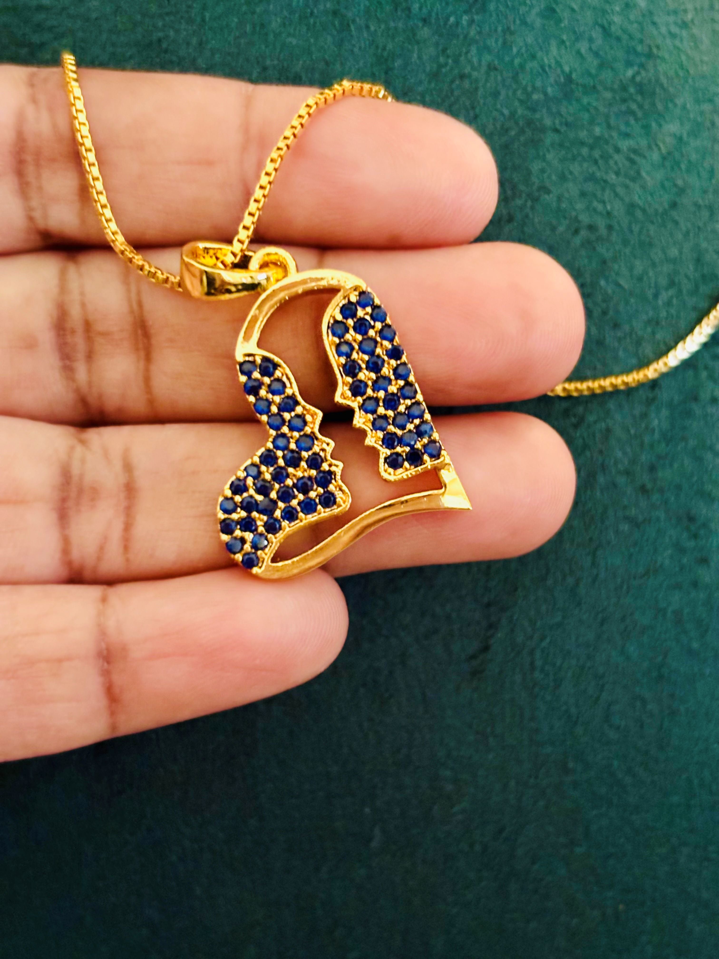 Gold-Plated Heart Pendant with Blue Sapphire Stones