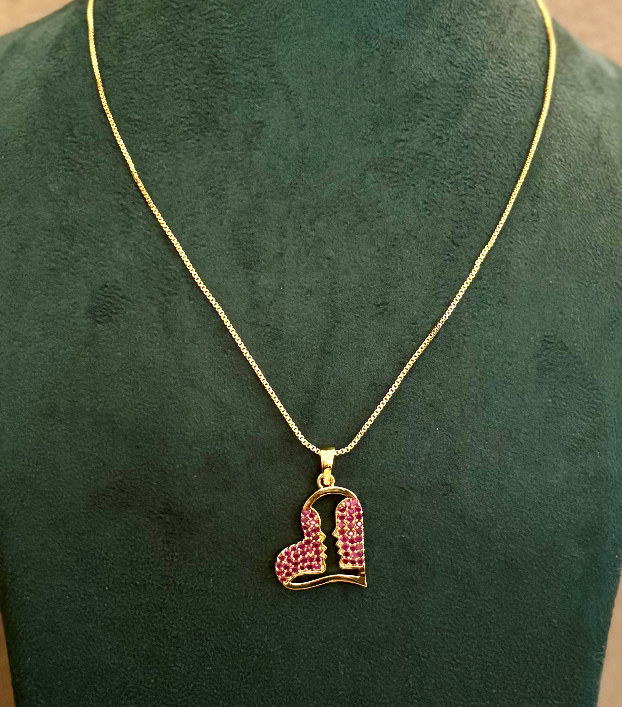 Gold-Plated Heart Pendant with Pink Ruby Stones