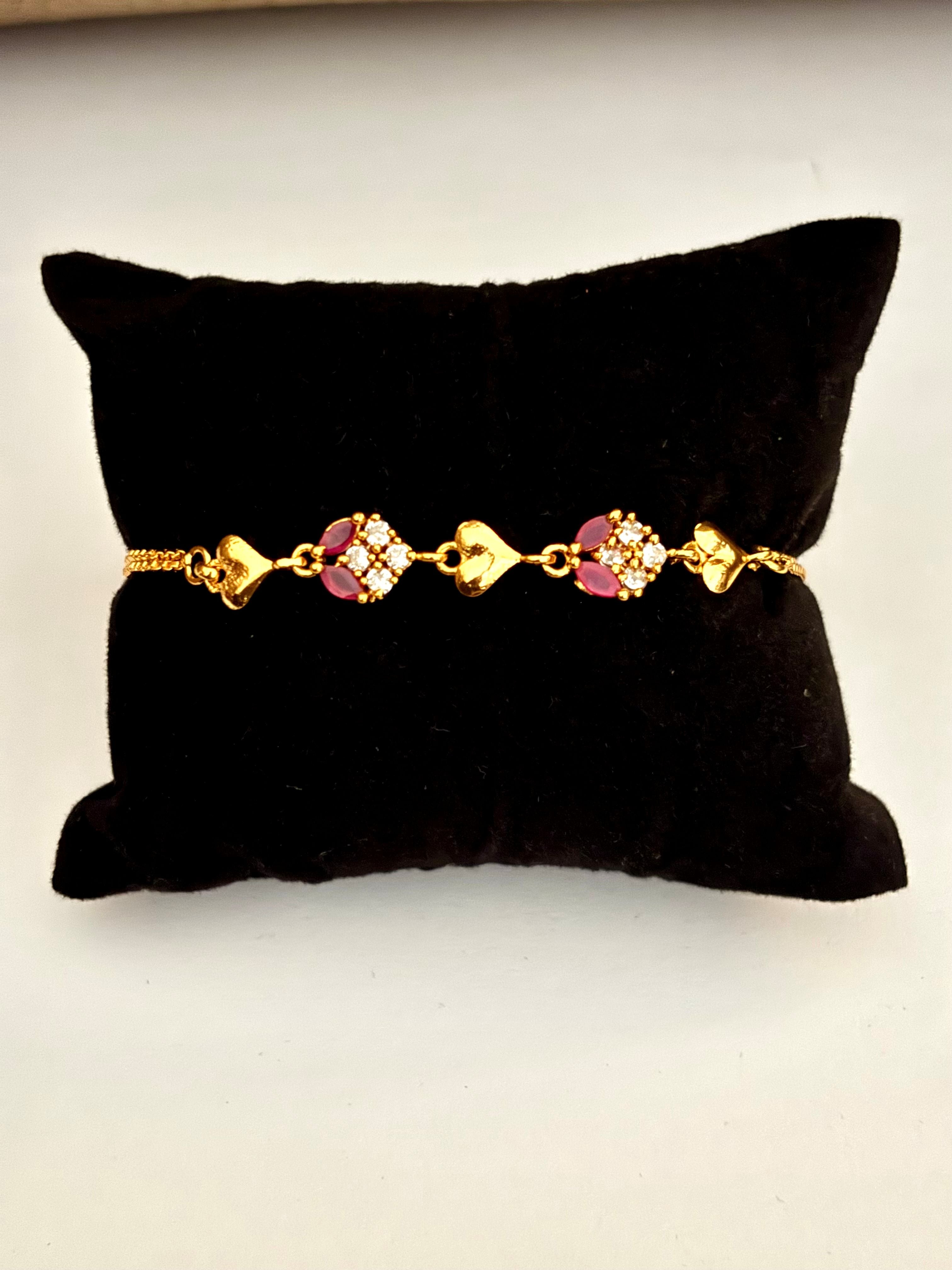 Gold-Plated Heart Bracelet with Ruby and White Stones
