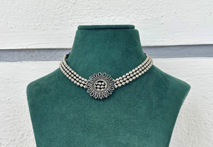 Necklace With Black Stone Floral Medallion