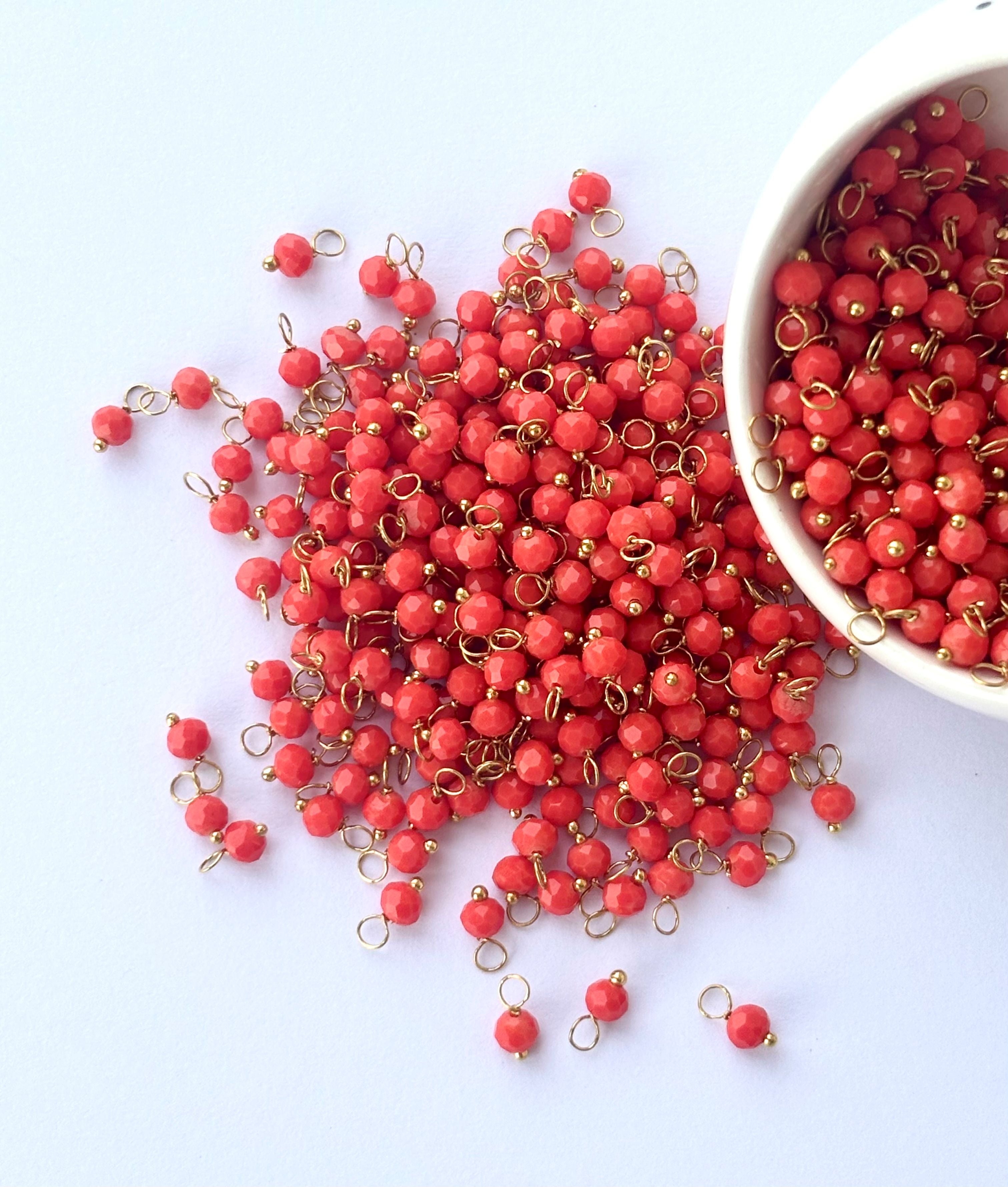 Faceted Coral Red Bead Charms with Gold Wire