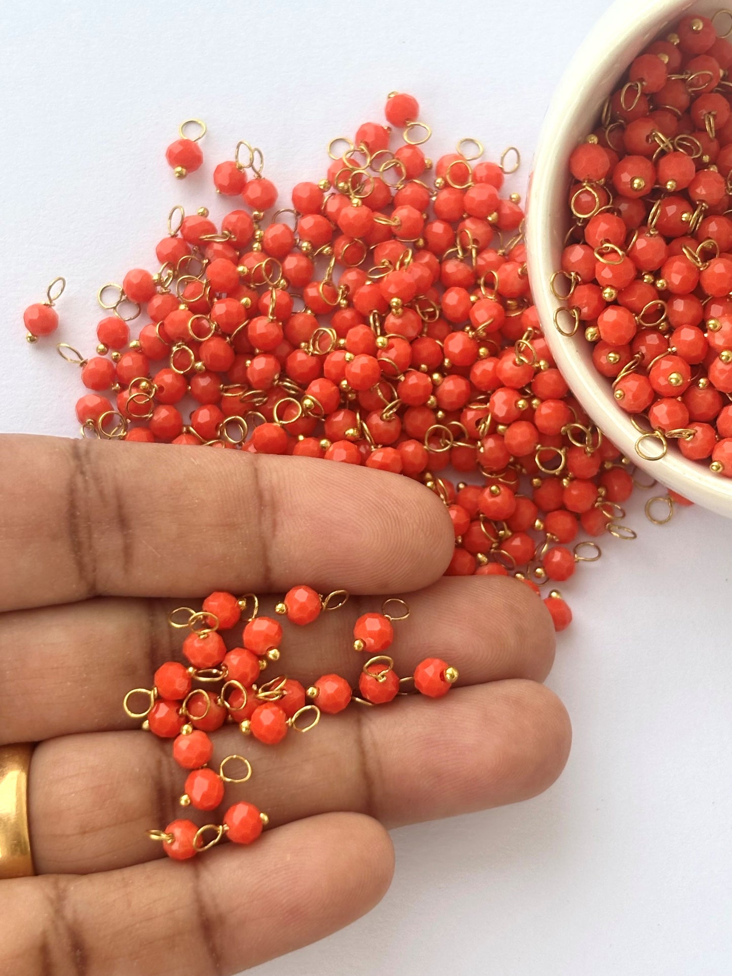 Faceted Coral Red Bead Charms with Gold Wire