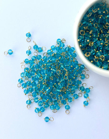 Faceted Teal Blue Bead Charms with Gold Wire