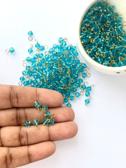 Faceted Teal Blue Bead Charms with Gold Wire