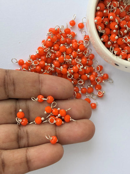 Faceted Orange Bead Charms with Silver Wire