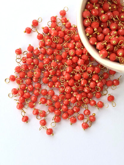 Faceted Coral Bead Charms with Gold Wire