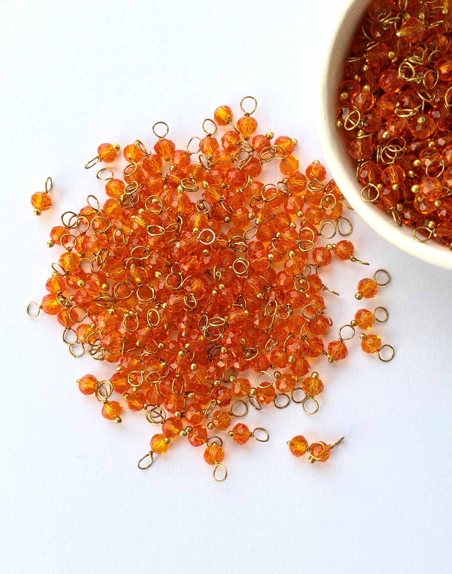 Faceted Fanta Orange Bead Charms with Gold Wire