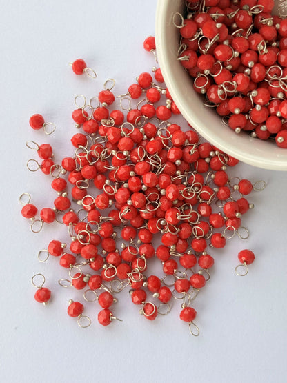 Faceted Coral Red Bead Charms with Silver Wire
