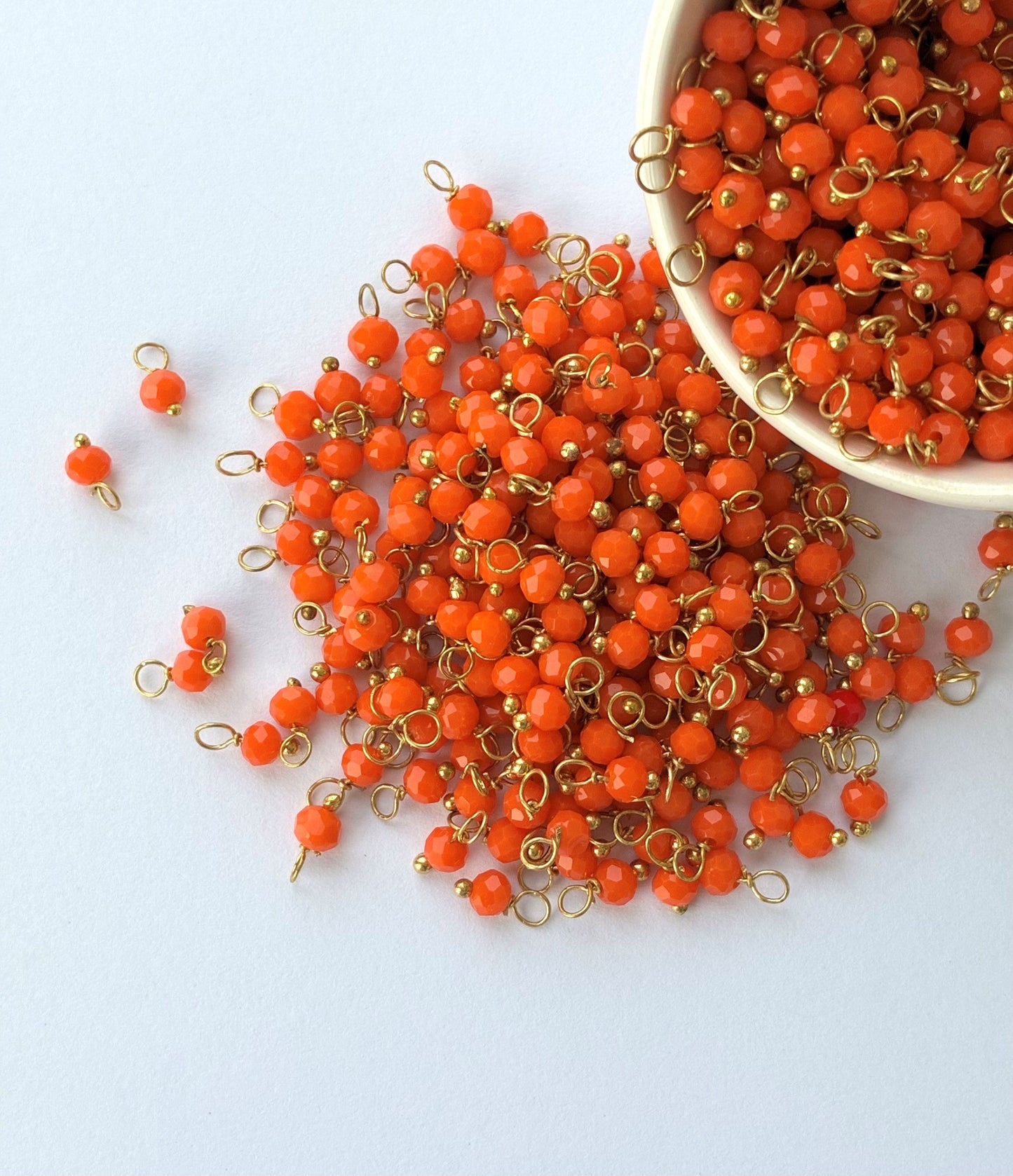 Faceted Orange Bead Charms with Gold Wire