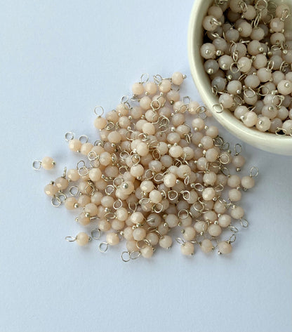 Faceted Beige Bead Charms with Silver Wire