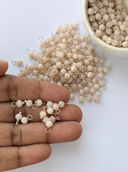 Faceted Beige Bead Charms with Silver Wire