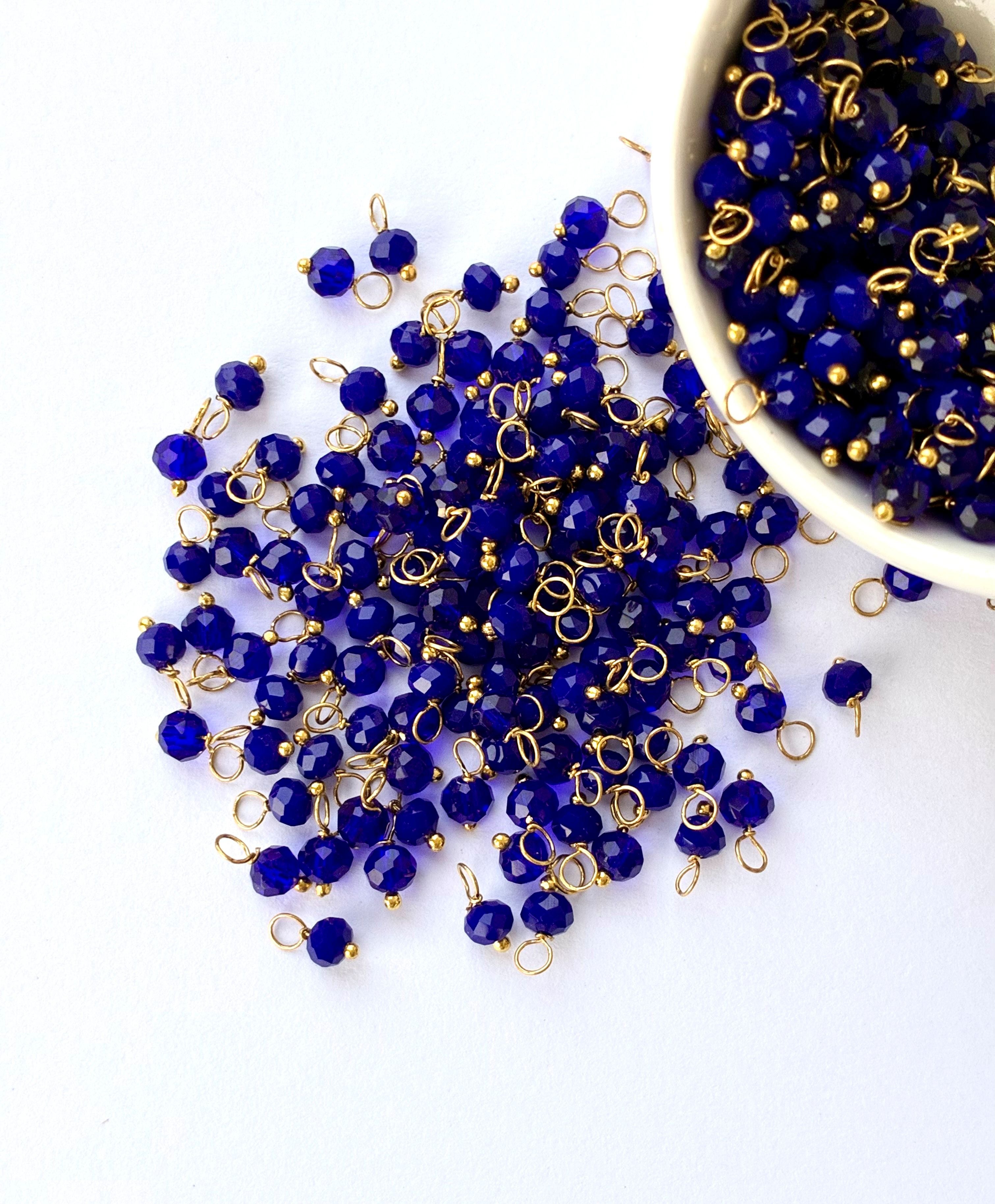 Faceted Deep Blue Bead Charms with Gold Wire