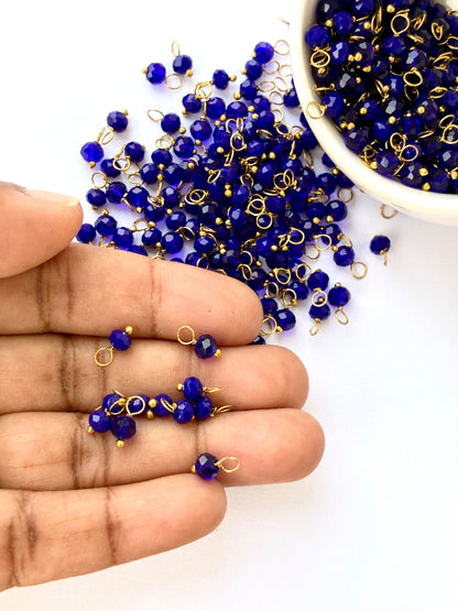 Faceted Deep Blue Bead Charms with Gold Wire