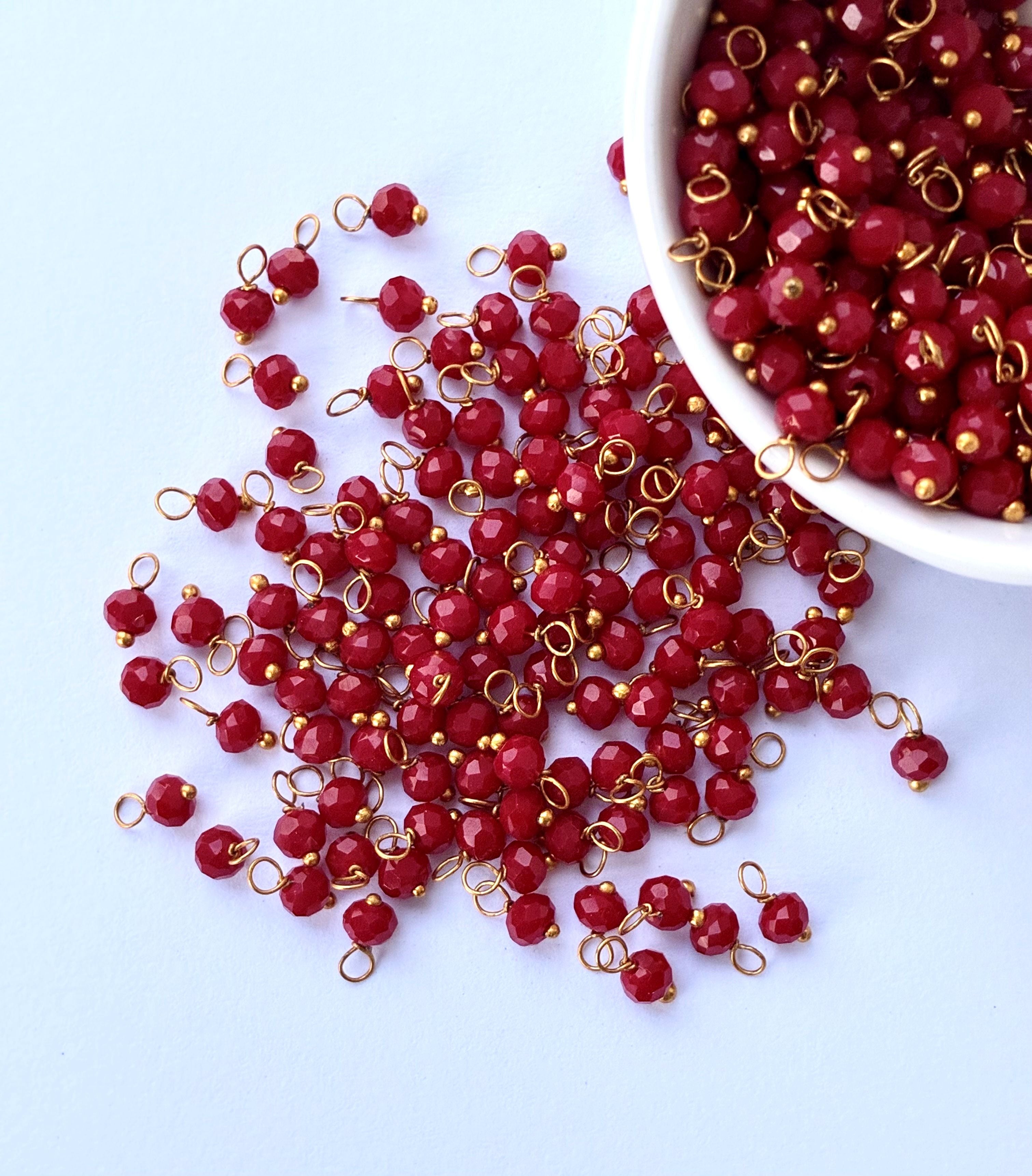 Faceted Maroon Red Bead Charms with Gold Wire