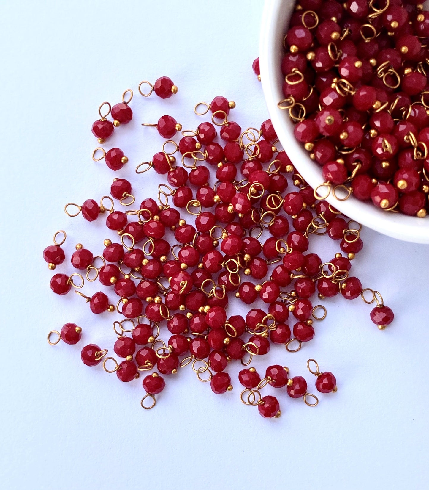 Faceted Maroon Red Bead Charms with Gold Wire