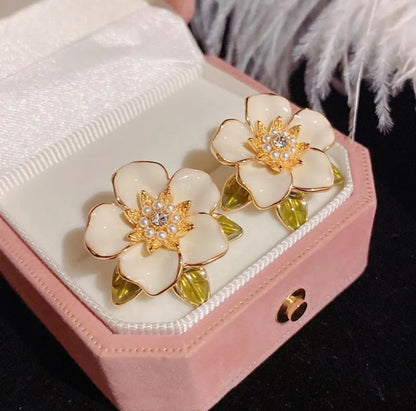 Gold and Enamel White Flower Stud Earrings