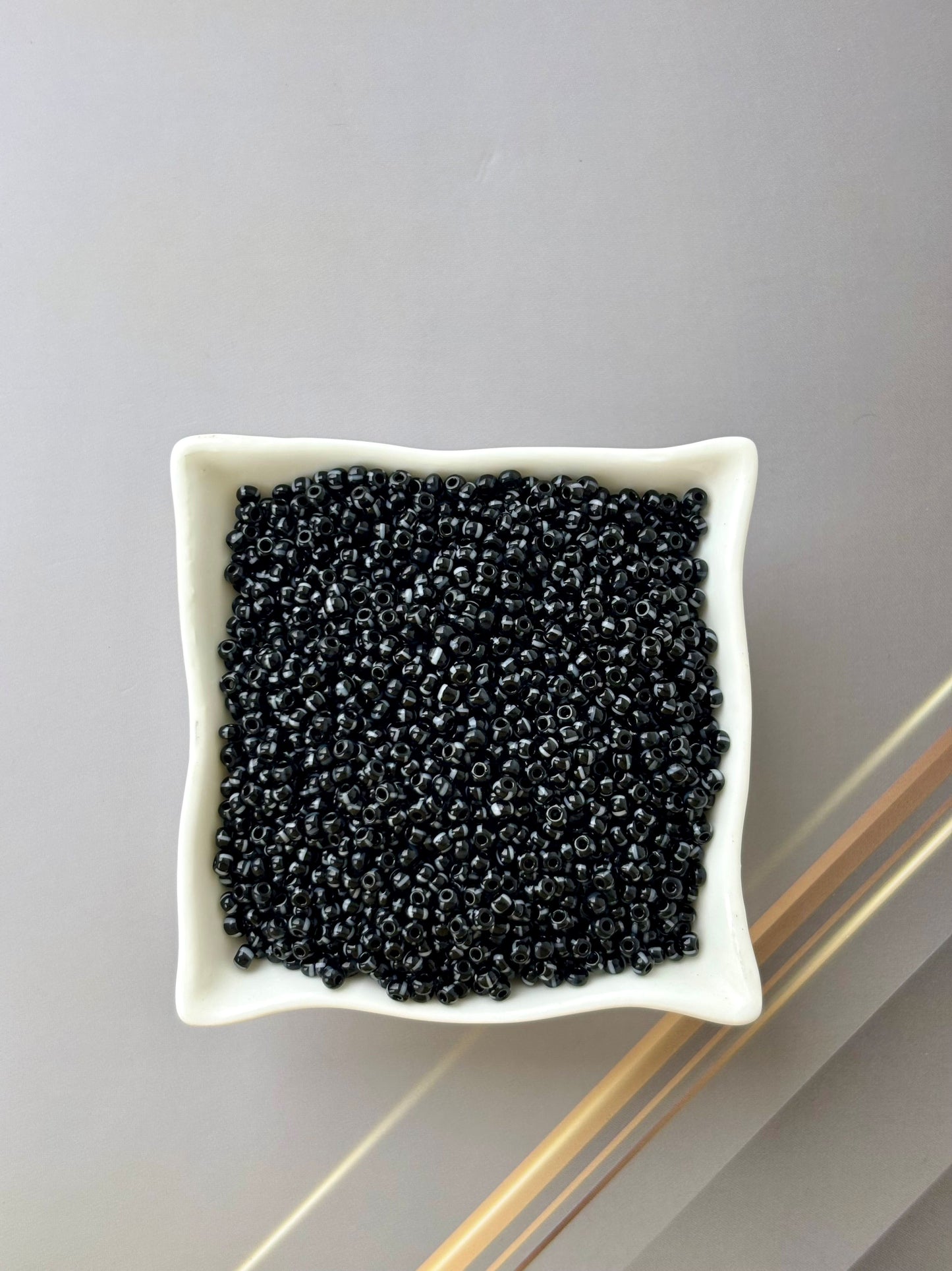 Preciosa White Lined Black Seed Beads