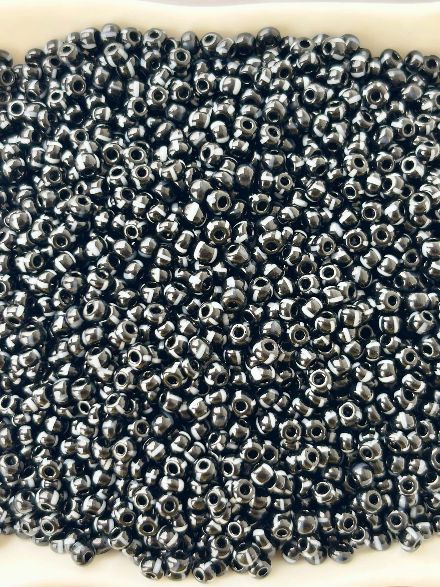 Preciosa White Lined Black Seed Beads