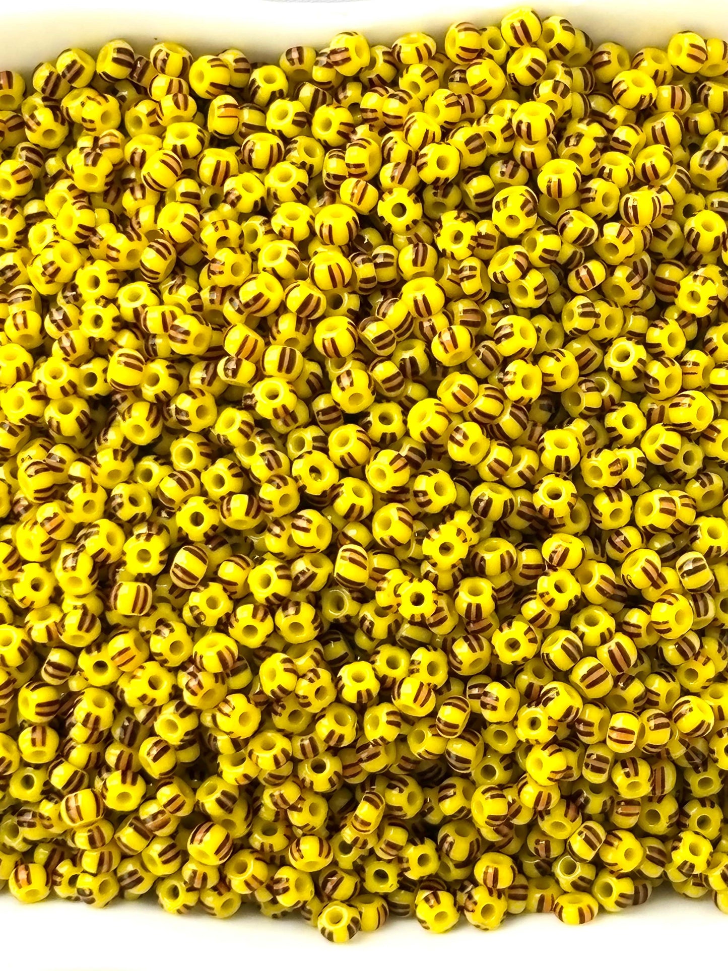 Preciosa Yellow with Brown Stripe Seed Beads