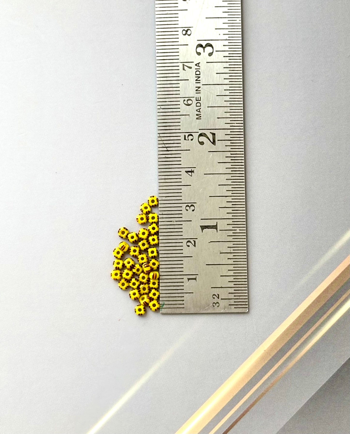 Preciosa Yellow with Brown Stripe Seed Beads