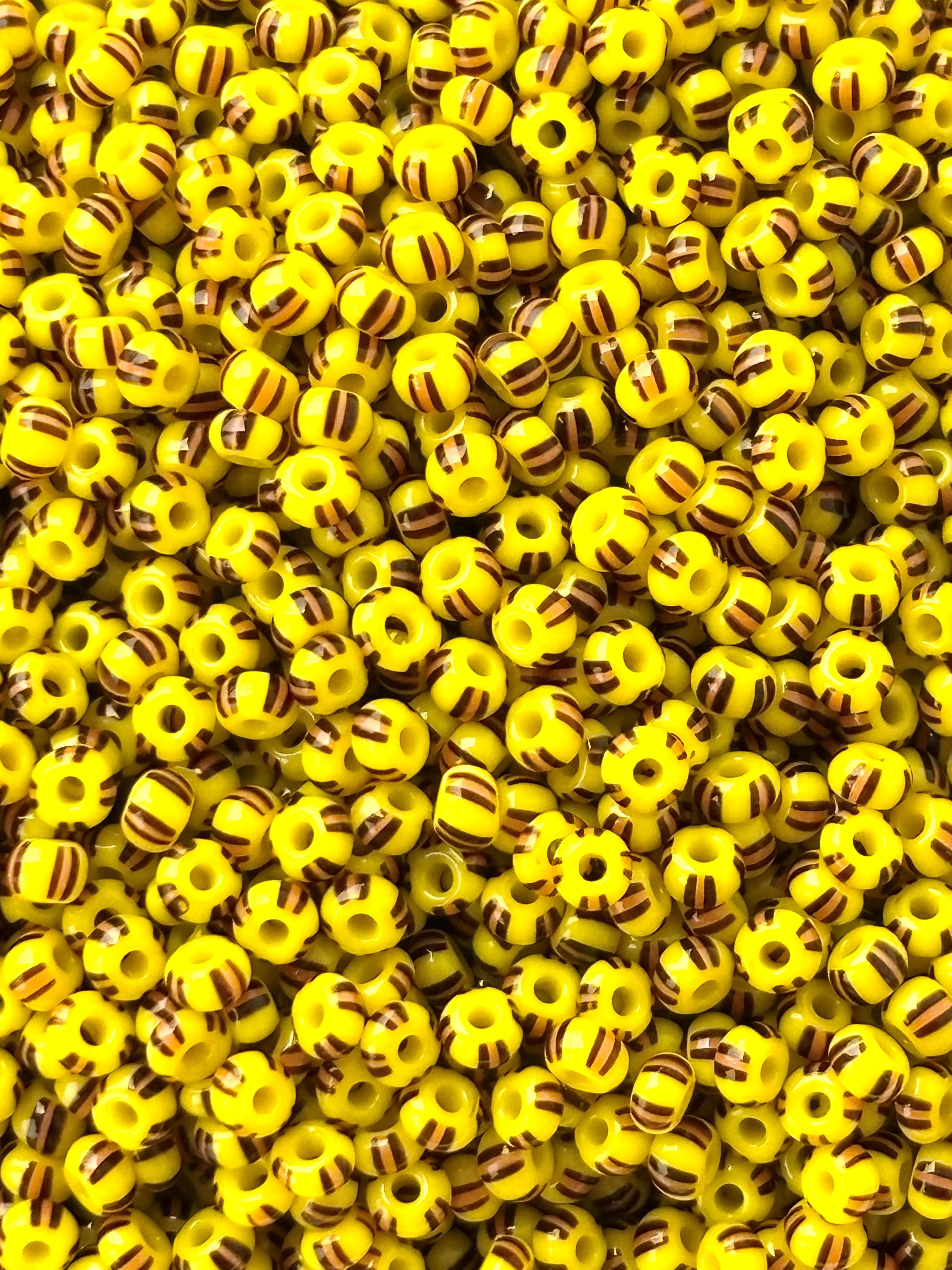 Preciosa Yellow with Brown Stripe Seed Beads