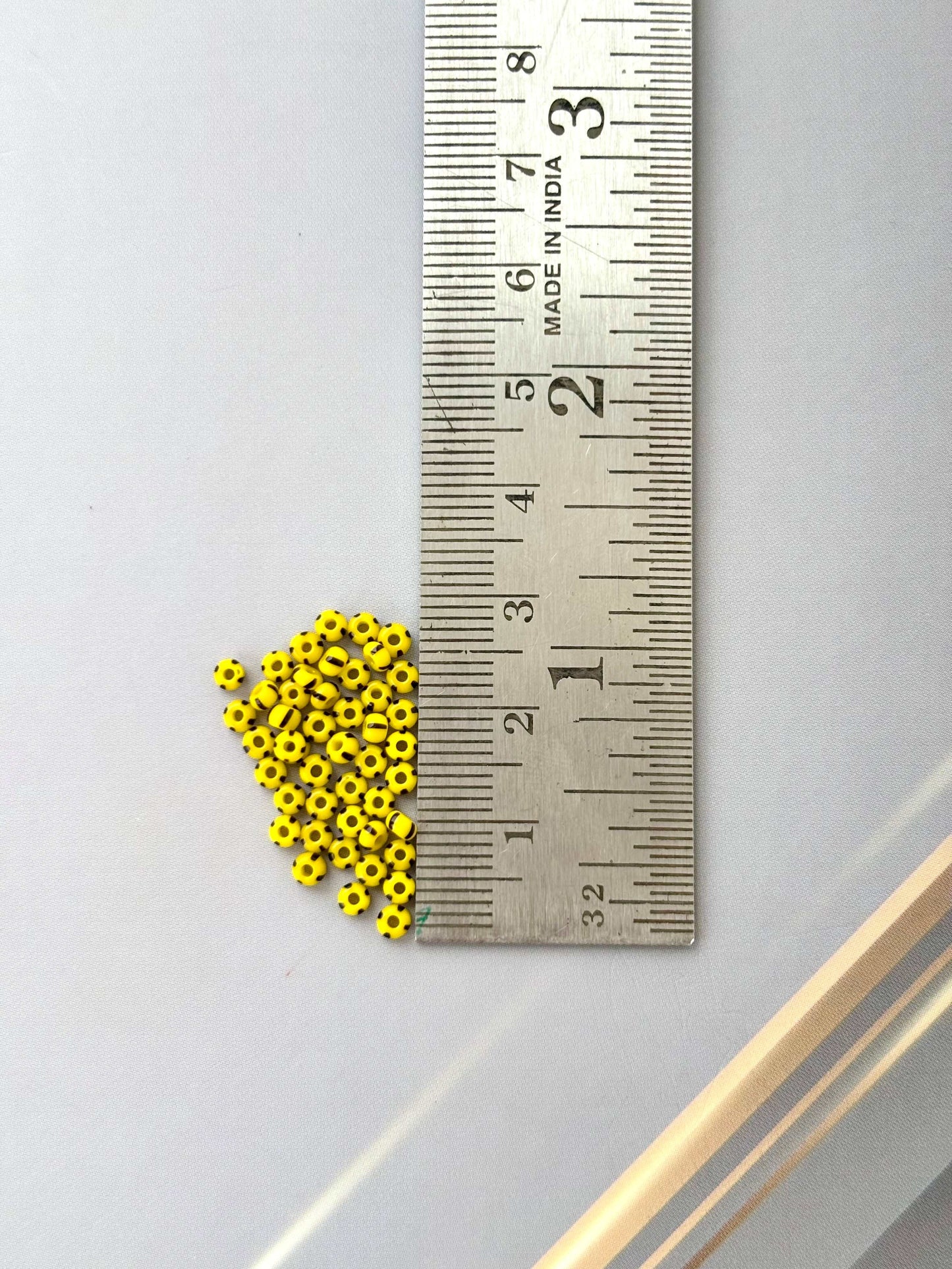 Preciosa Yellow with Brown Thick Stripe Seed Beads