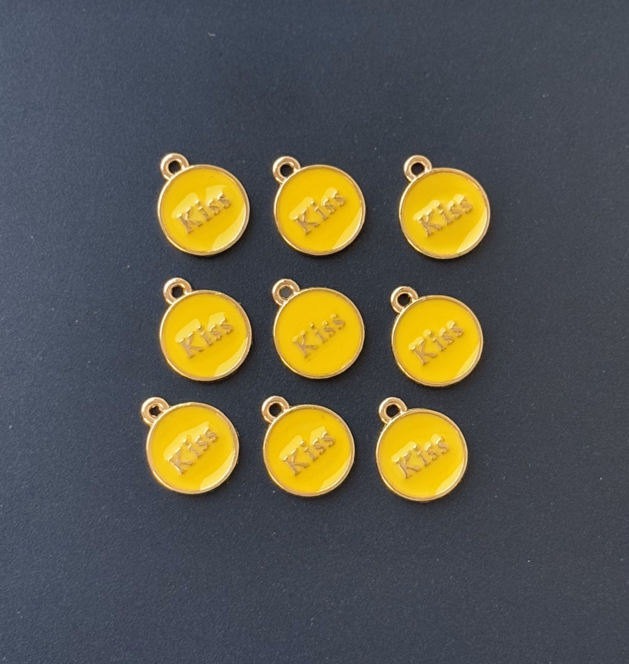 Four Pieces Enamelled Charms - Yellow Kiss Charms