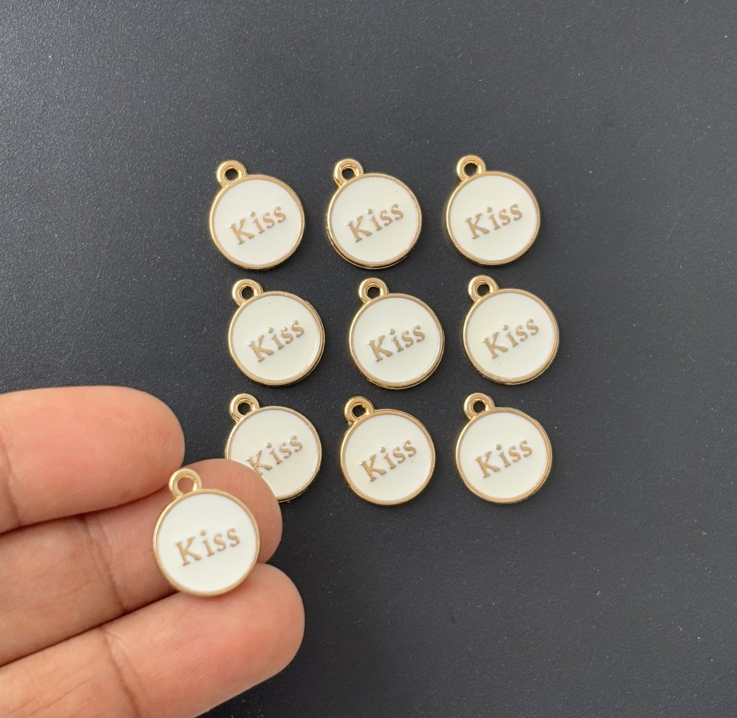 Four Pieces Enamelled Charms - White Kiss Charms
