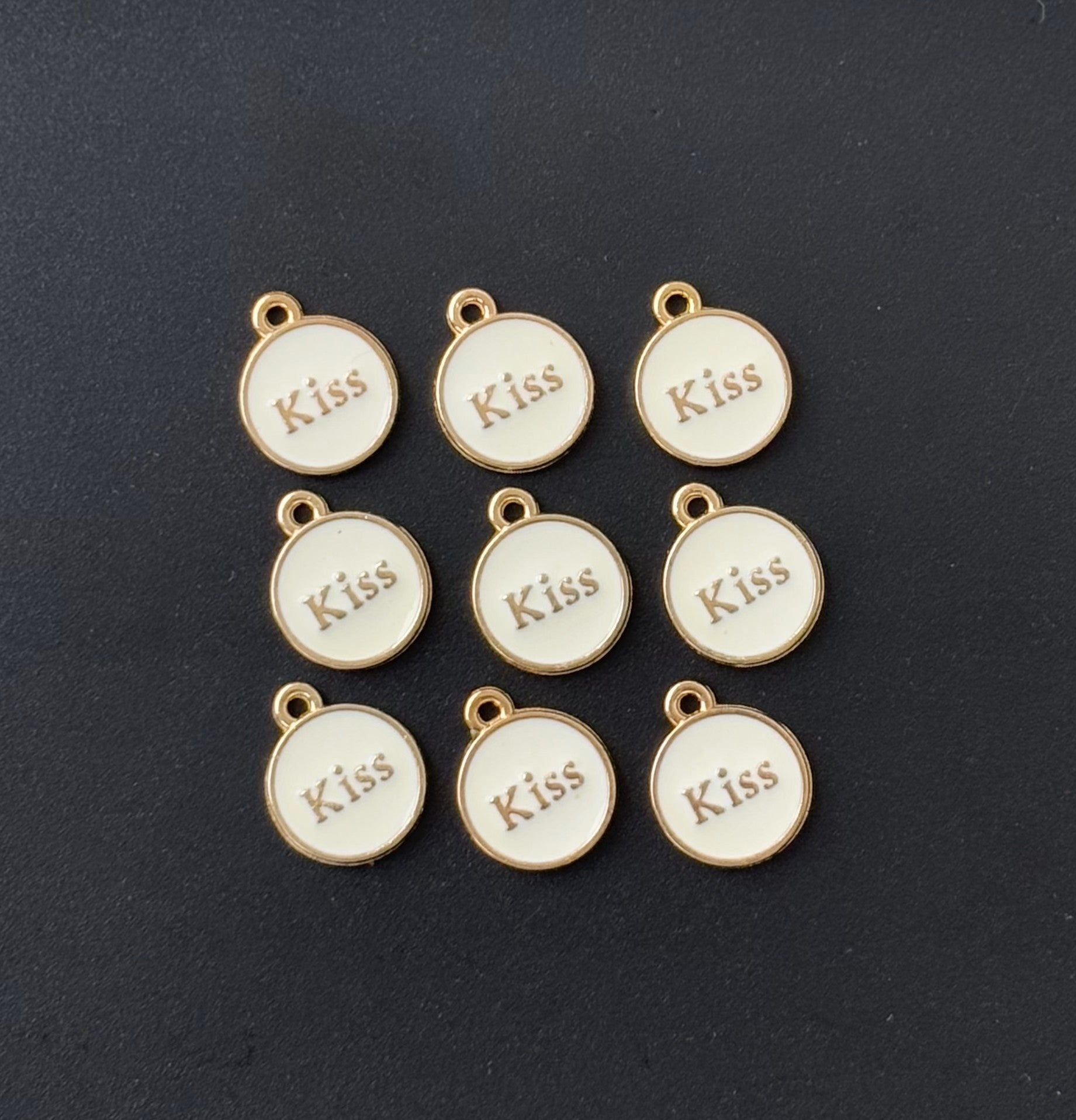 Four Pieces Enamelled Charms - White Kiss Charms