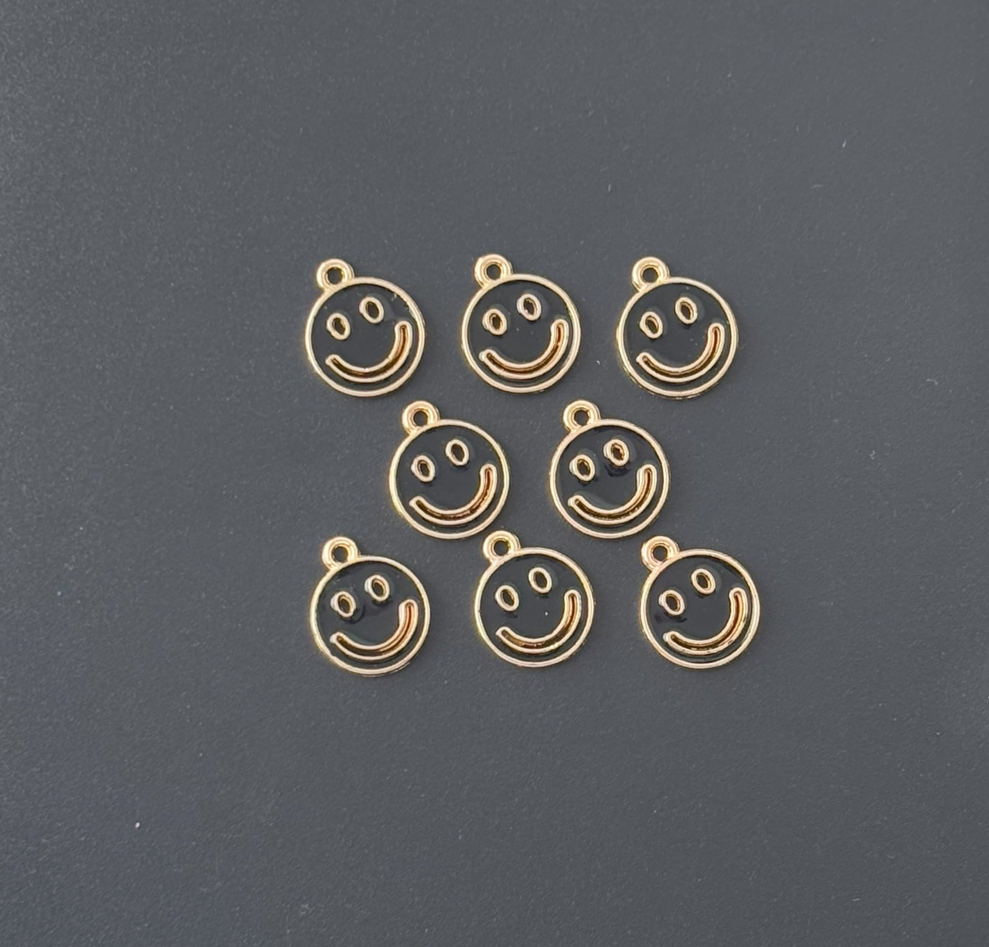 Four Pieces Enamelled Charms - Black Smiley Charms with Golden Smile