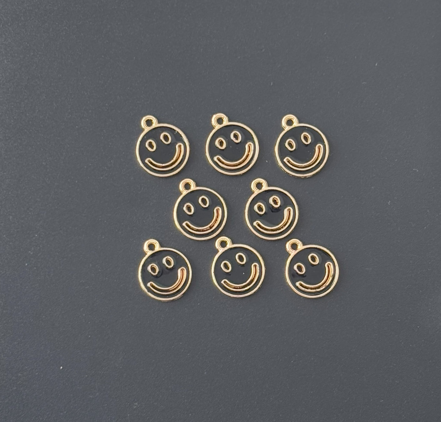Four Pieces Enamelled Charms - Black Smiley Charms with Golden Smile