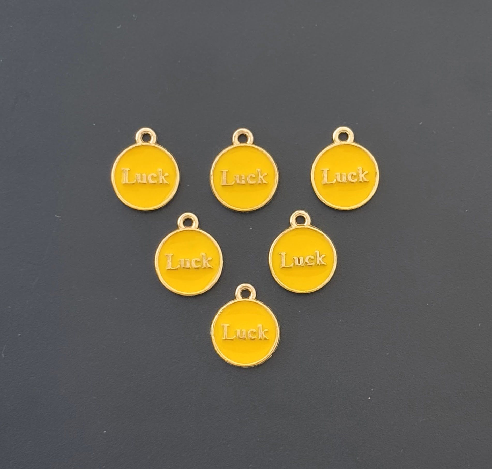 Four Pieces Enamelled Charms - Yellow Luck Charms