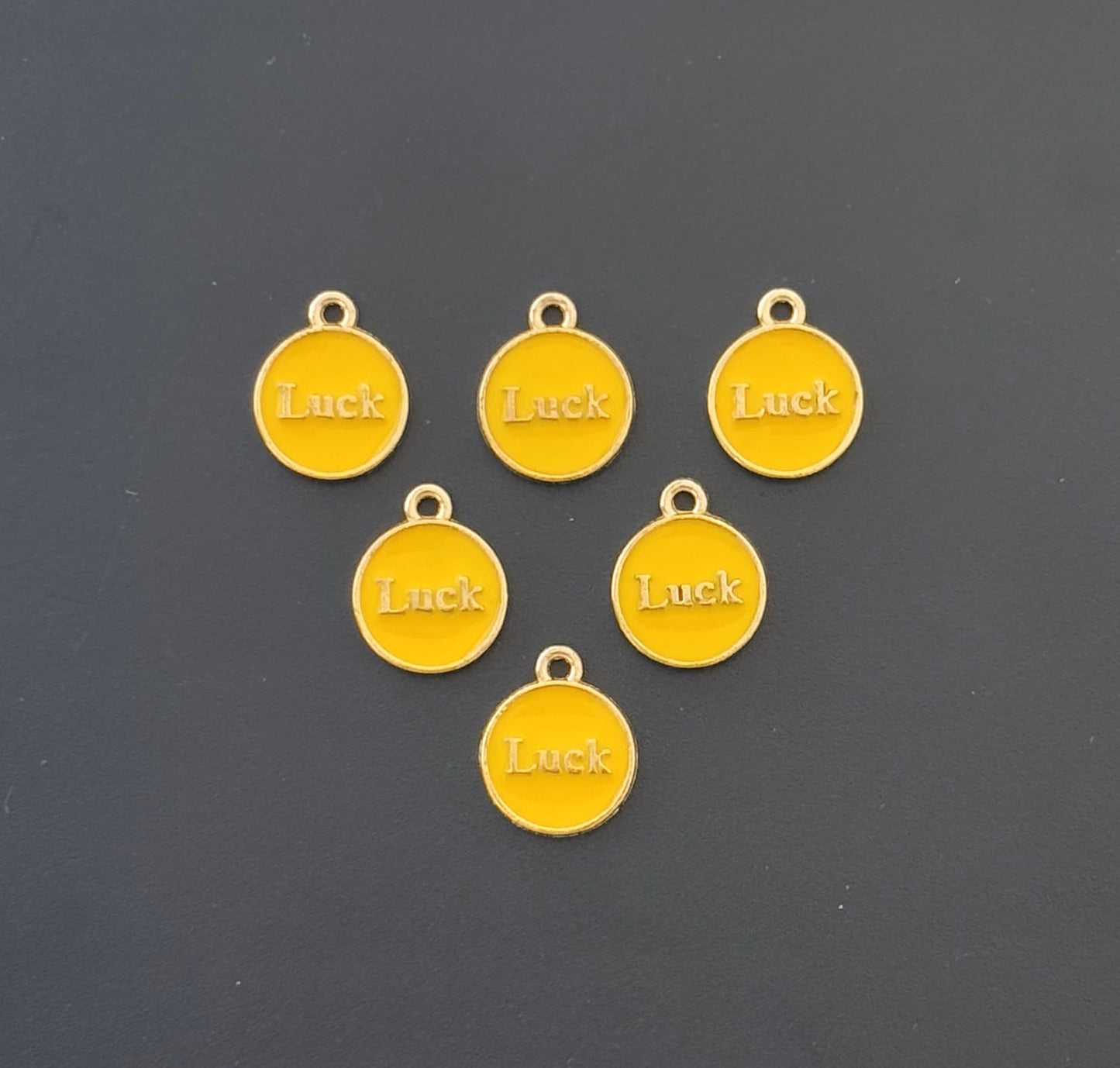 Four Pieces Enamelled Charms - Yellow Luck Charms