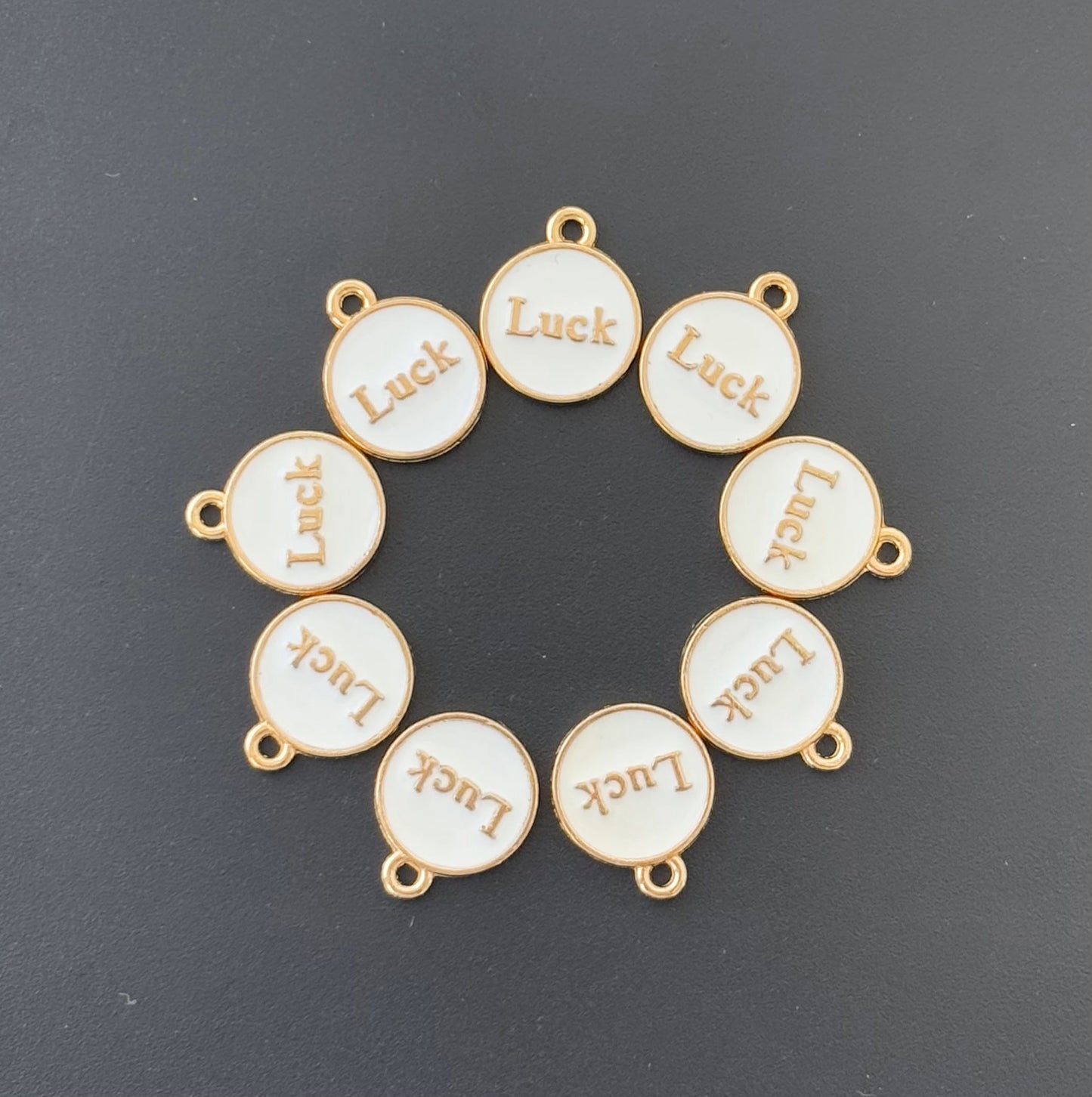 Four Pieces Enamelled Charms - White Luck Charms