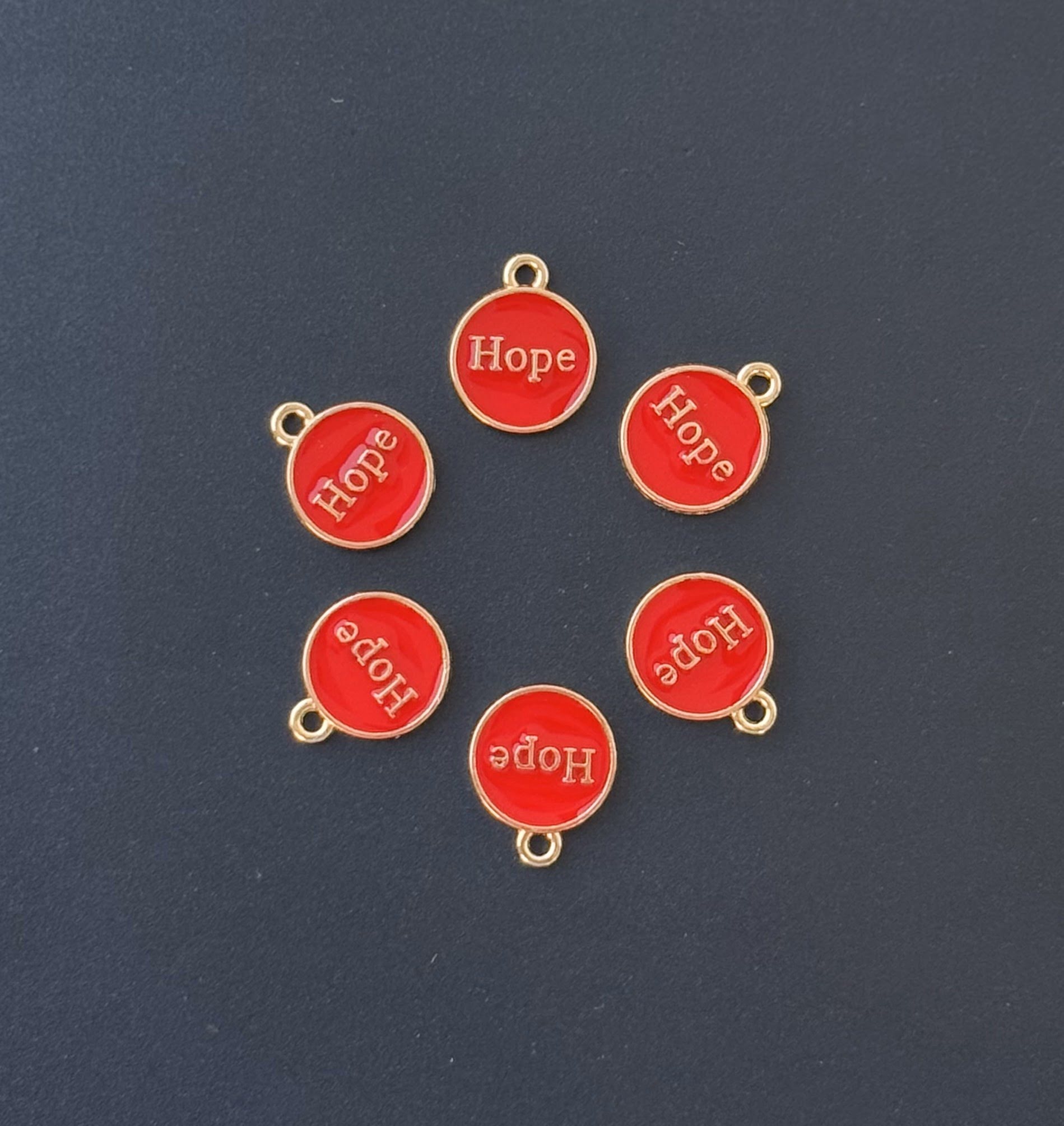 Four Pieces Enamelled Charms - Red Hope Charms