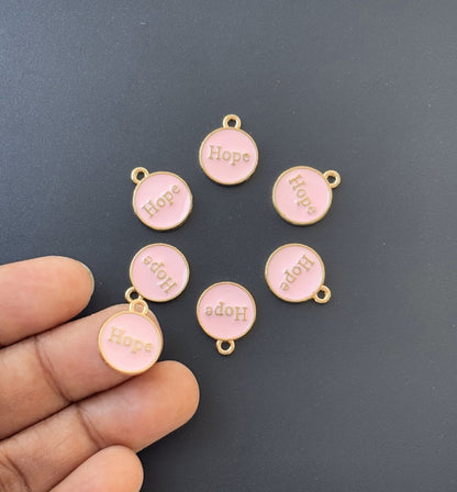 Four Pieces Enamelled Charms - Pink Hope Charms