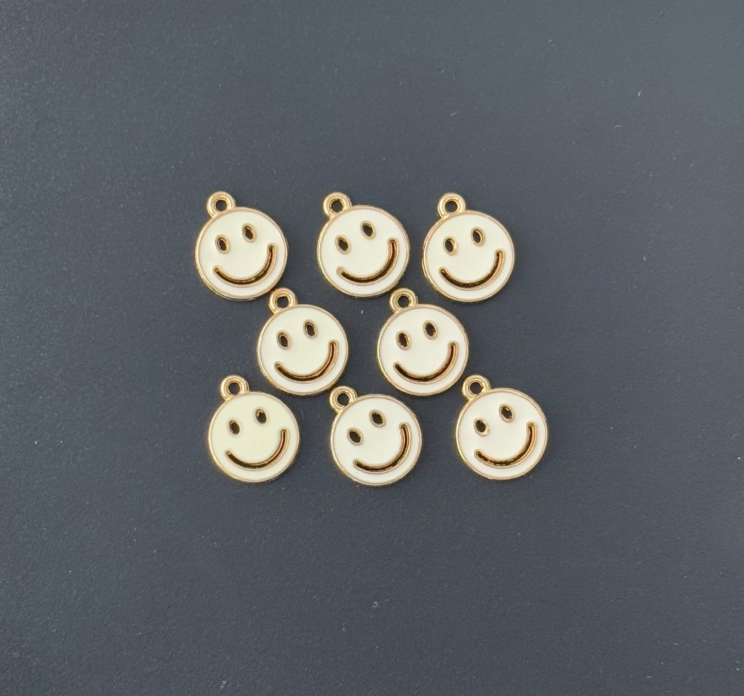 Four Pieces Enamelled Charms - White Smiley Charms
