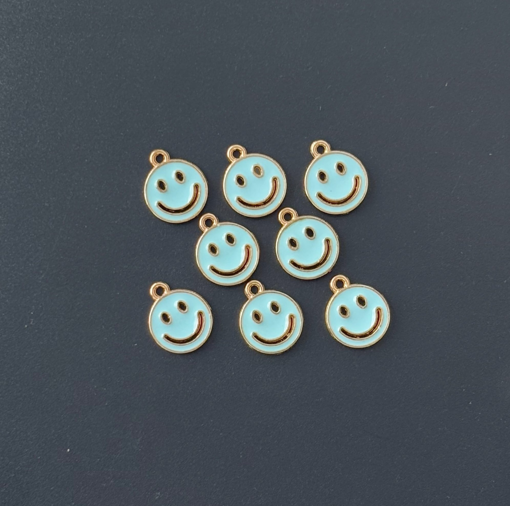 Four Pieces Enamelled Charms - Sky Blue Smiley Charms