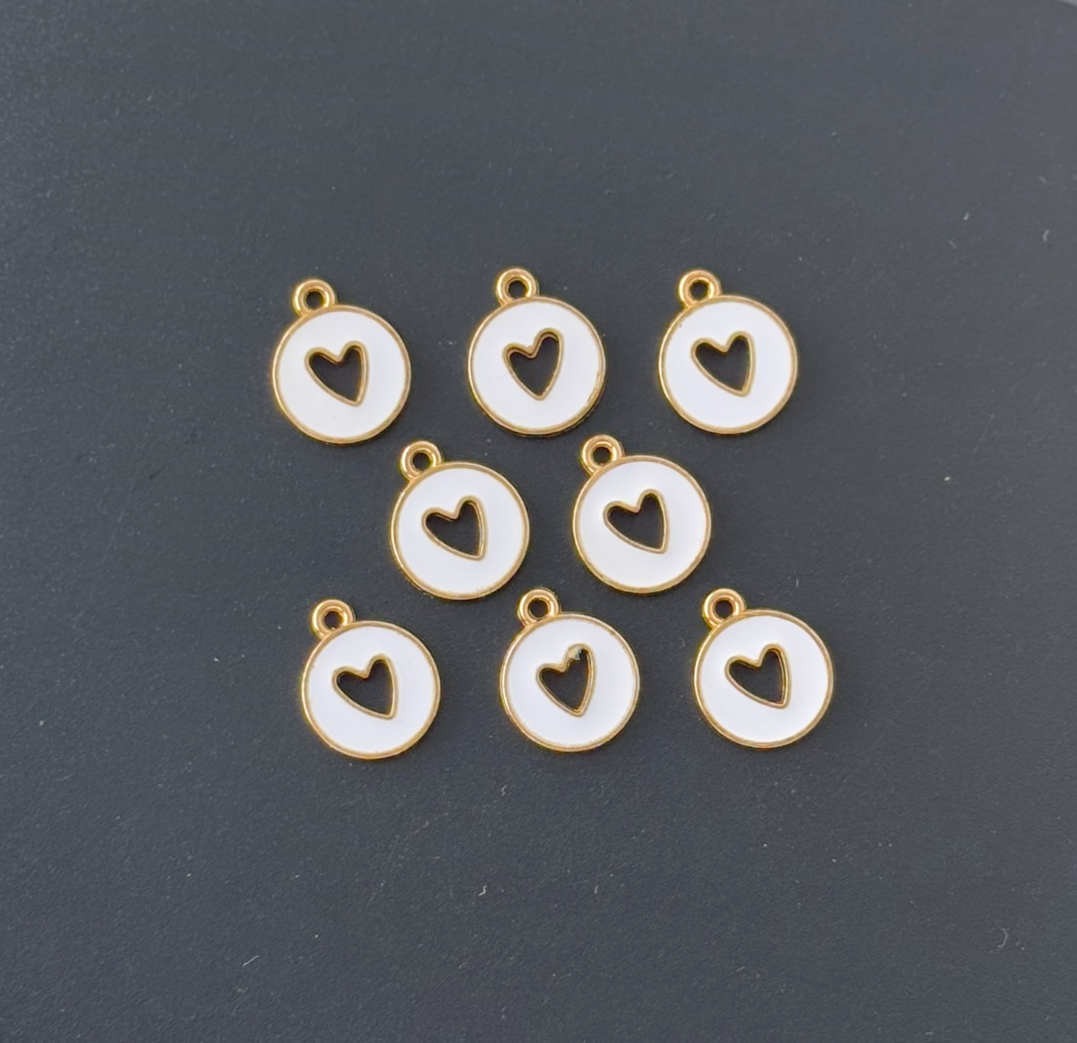 Four Pieces Enamelled Charms - White Heart Cutout Charms