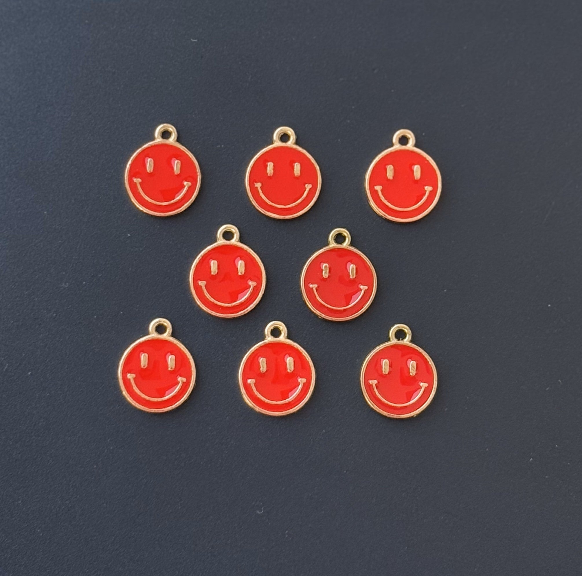 Four Pieces Enamelled Charms - Red Smiley Charms