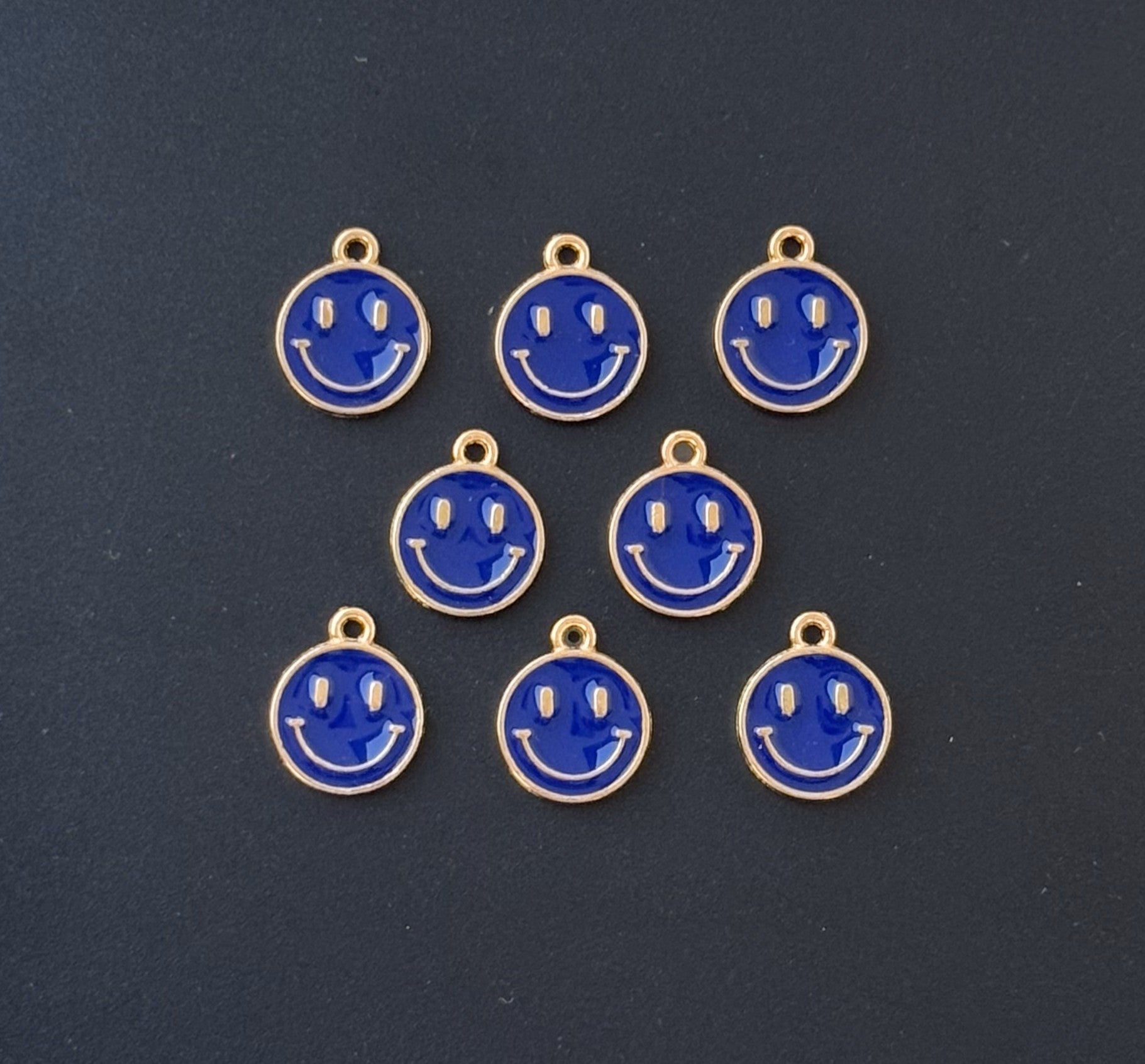 Four Pieces Enamelled Charms - Blue Smiley Charms
