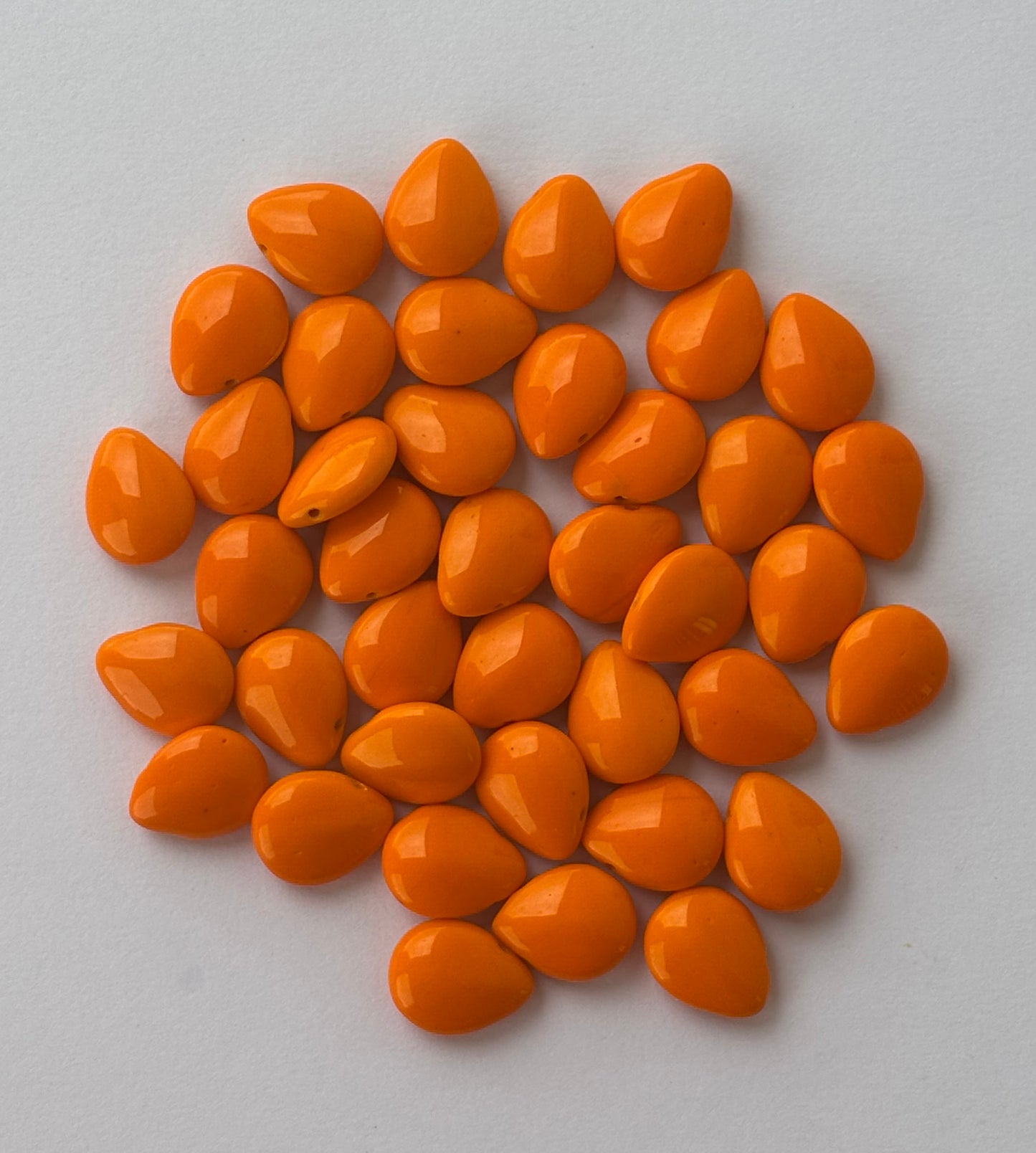 Smooth Teardrop Shaped Orange Pip Beads