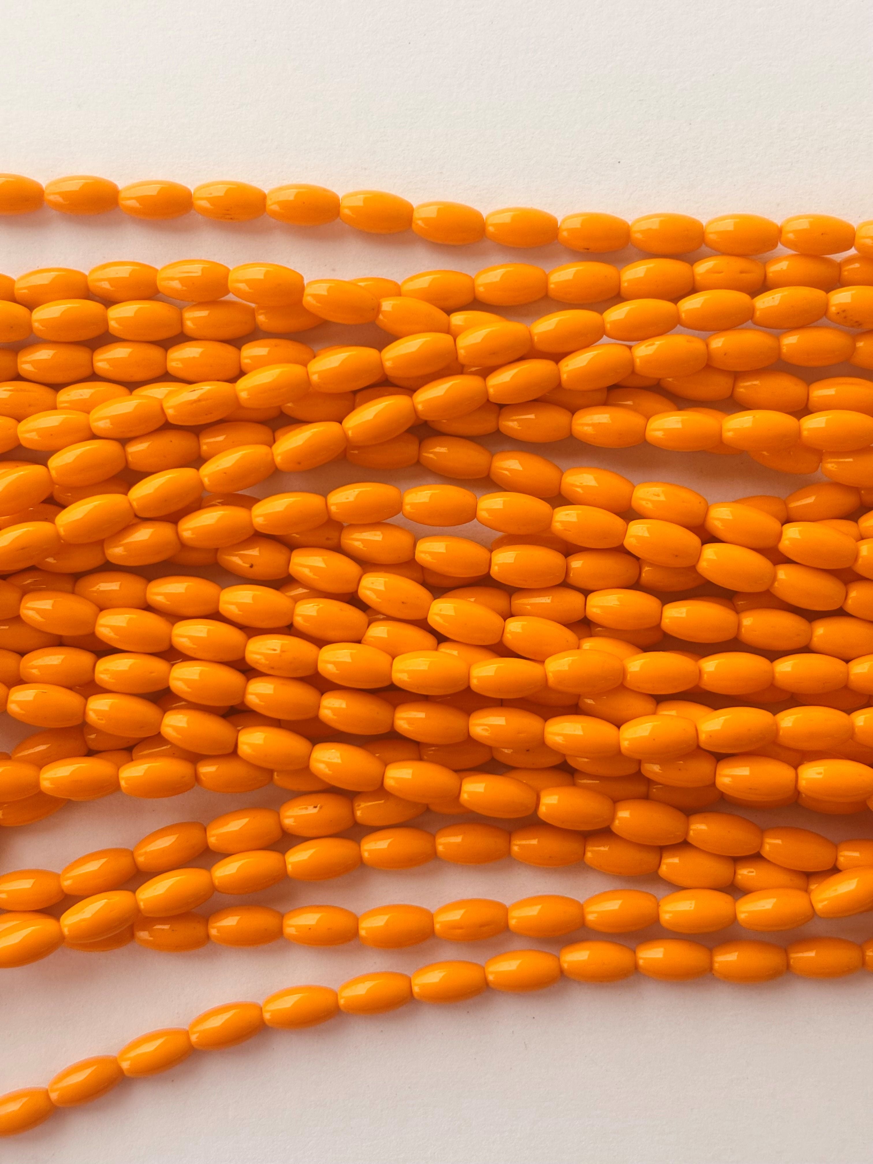 Smooth High Shine Monalisa Orange Oval Beads