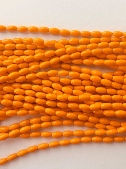 Smooth High Shine Monalisa Orange Oval Beads