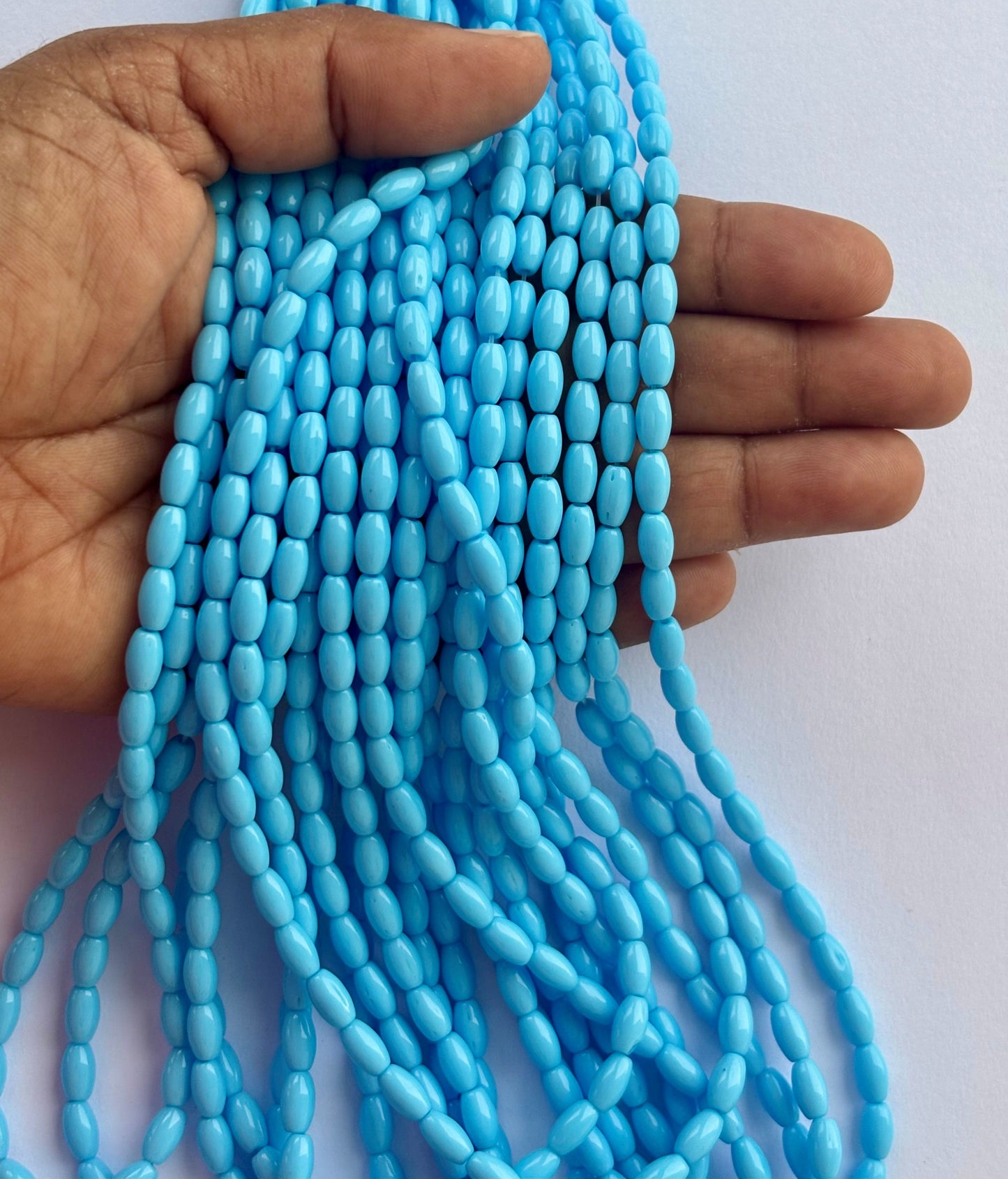 Smooth High Shine Monalisa Sky Blue Oval Beads