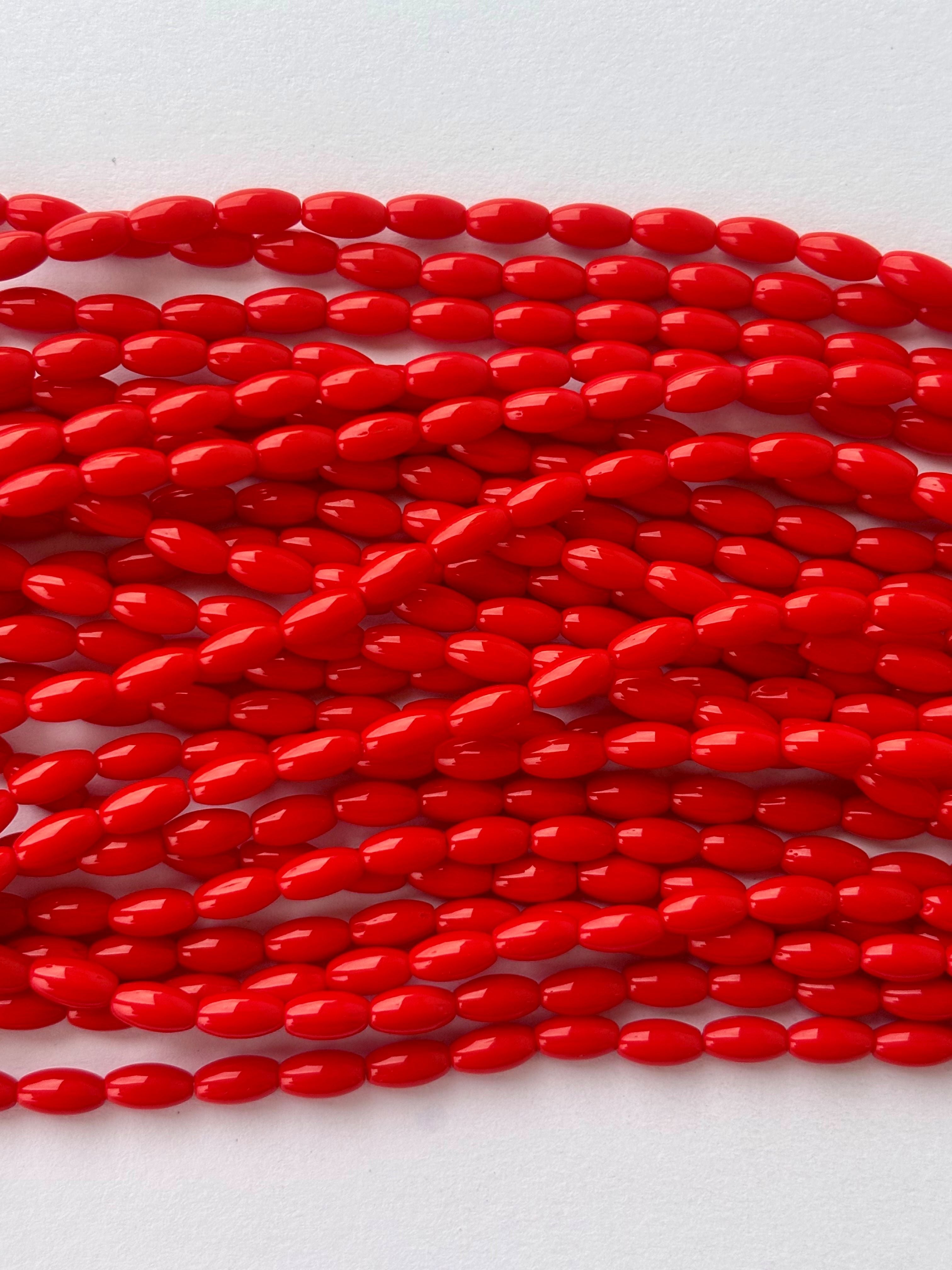 Smooth High Shine Monalisa Red Oval Beads