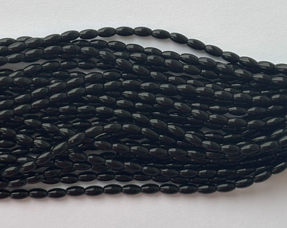 Smooth High Shine Monalisa Black Oval Beads