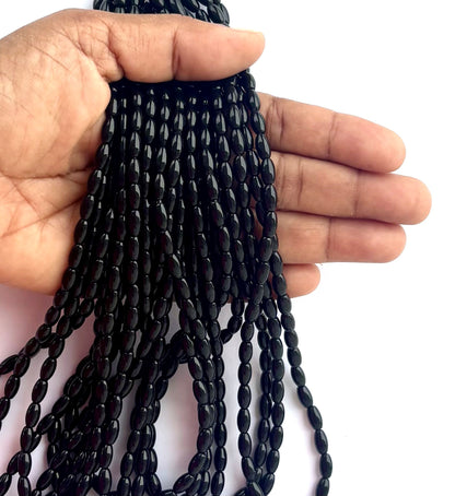 Smooth High Shine Monalisa Black Oval Beads