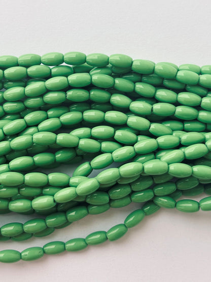 Smooth High Shine Monalisa Pastel Green Oval Beads