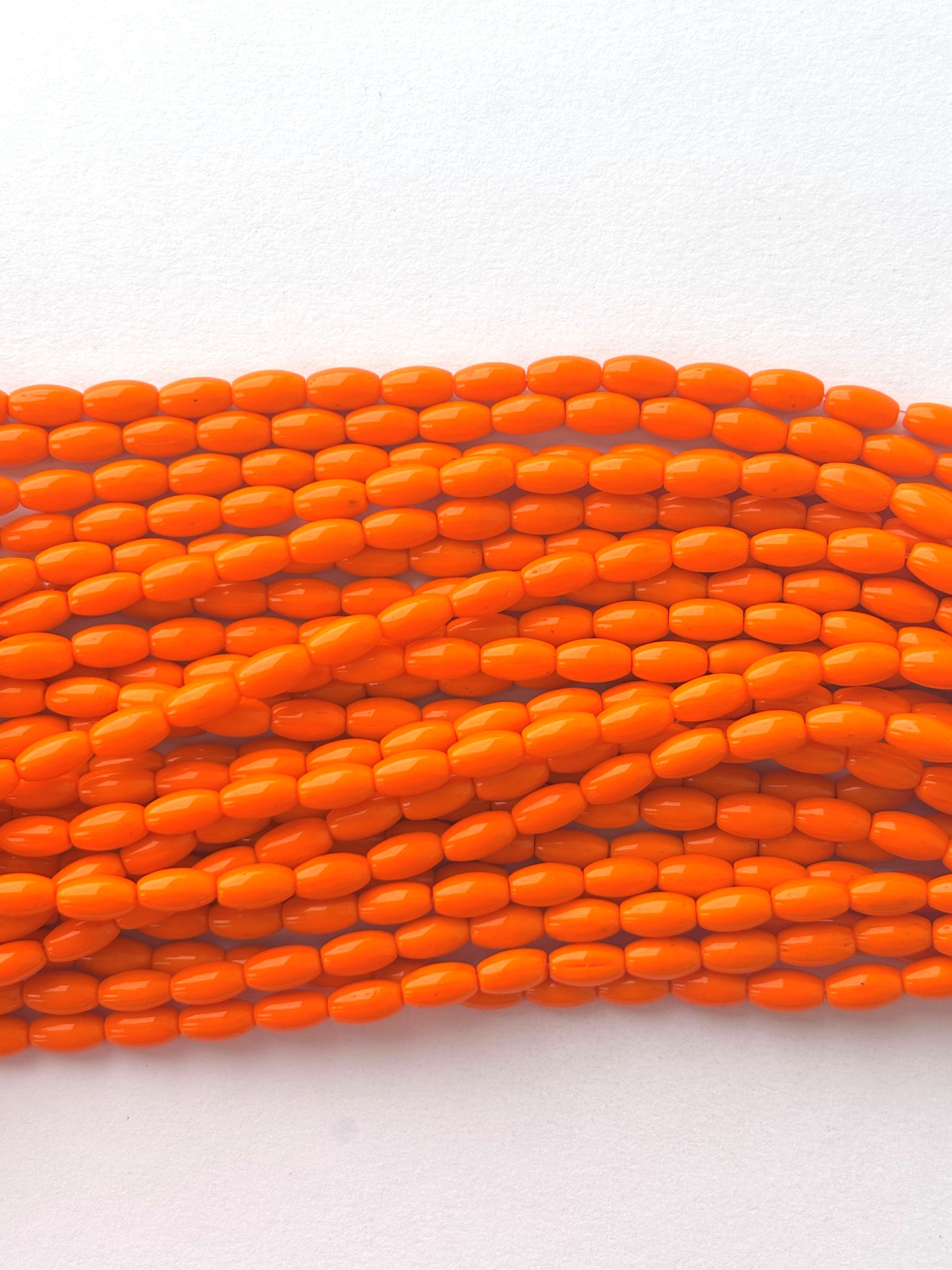 Smooth High Shine Monalisa Bright Orange Oval Beads